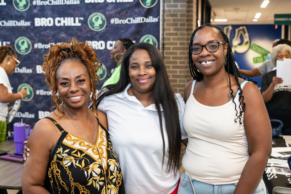 Community members smiling together at Care Fest