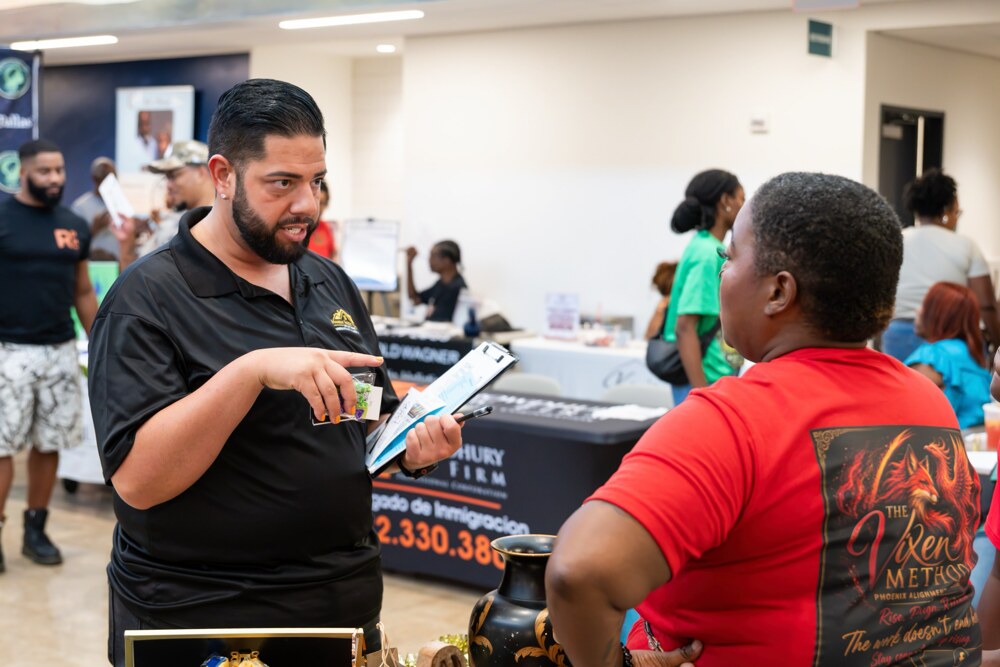 Care Fest attendee connecting with an exhibitor