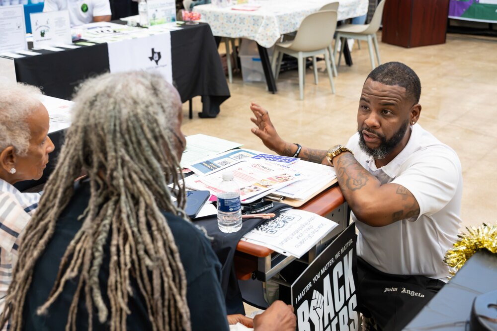 A community member speaking with a resource provider